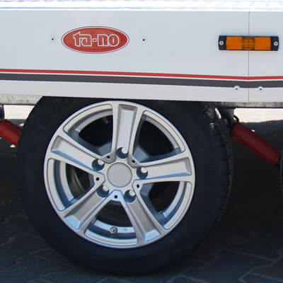 Powder-coated side panels, Alloy rims, Shock absorbers.